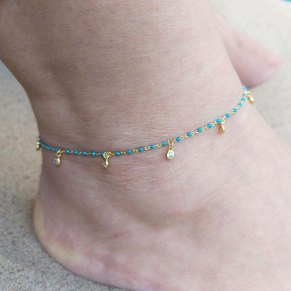 blue beaded anklet on ankle