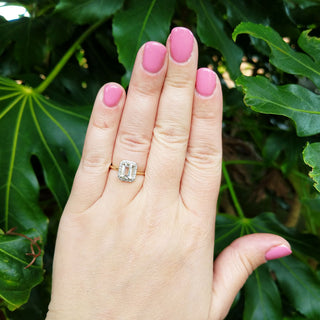 morganite and diamond ring on hand