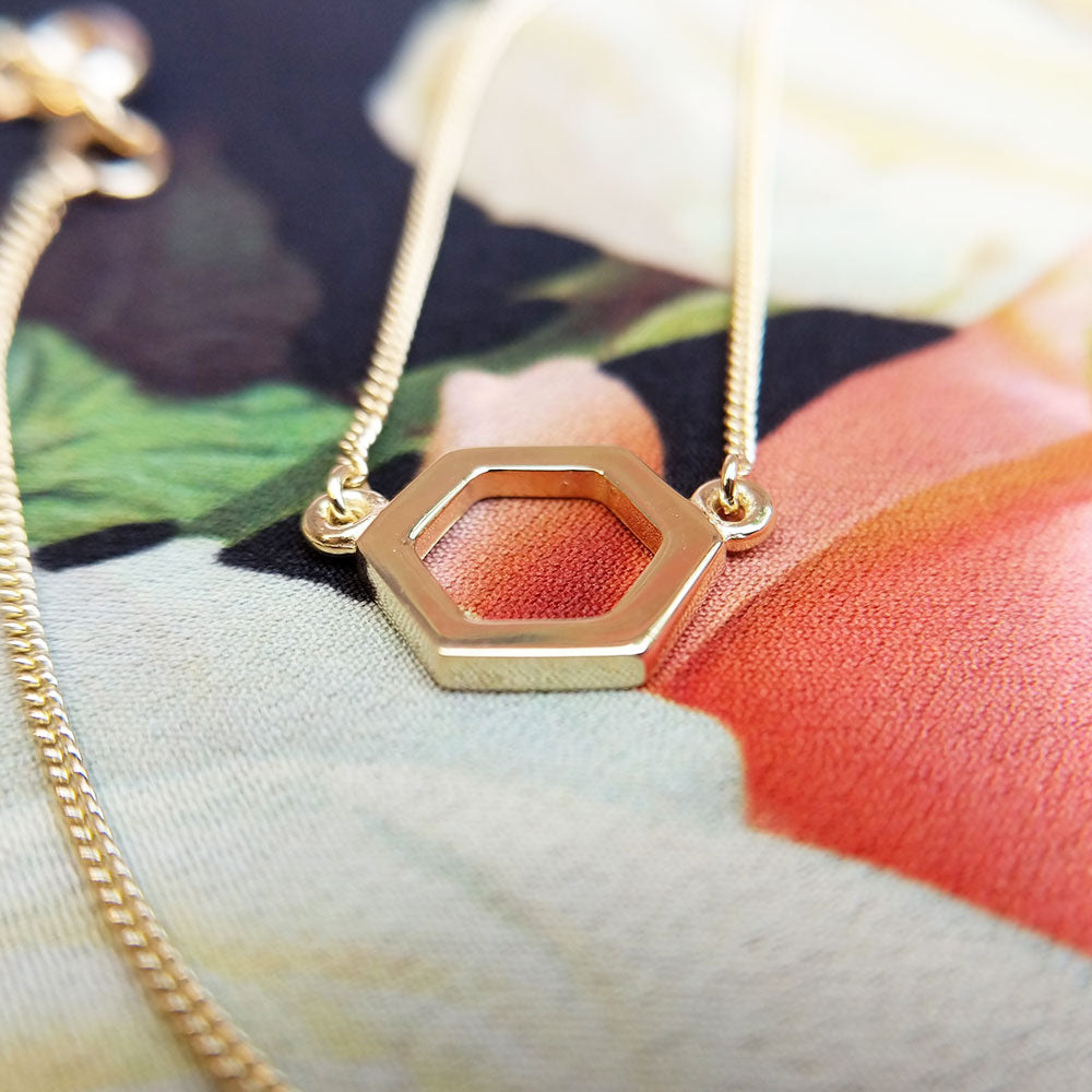 ladies gold hexagon shape necklace
