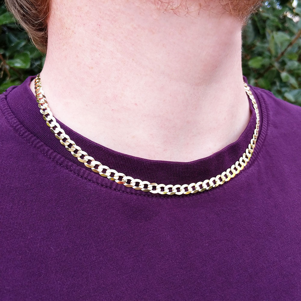 close up of gold curb chain
