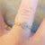 diamond stacking ring on finger