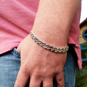 men's silver curb bracelet on wrist