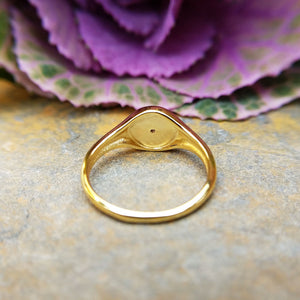 underside of small round signet ring