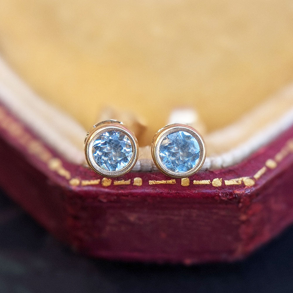 close up of topaz earrings