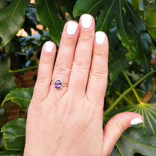 amethyst ring on hand