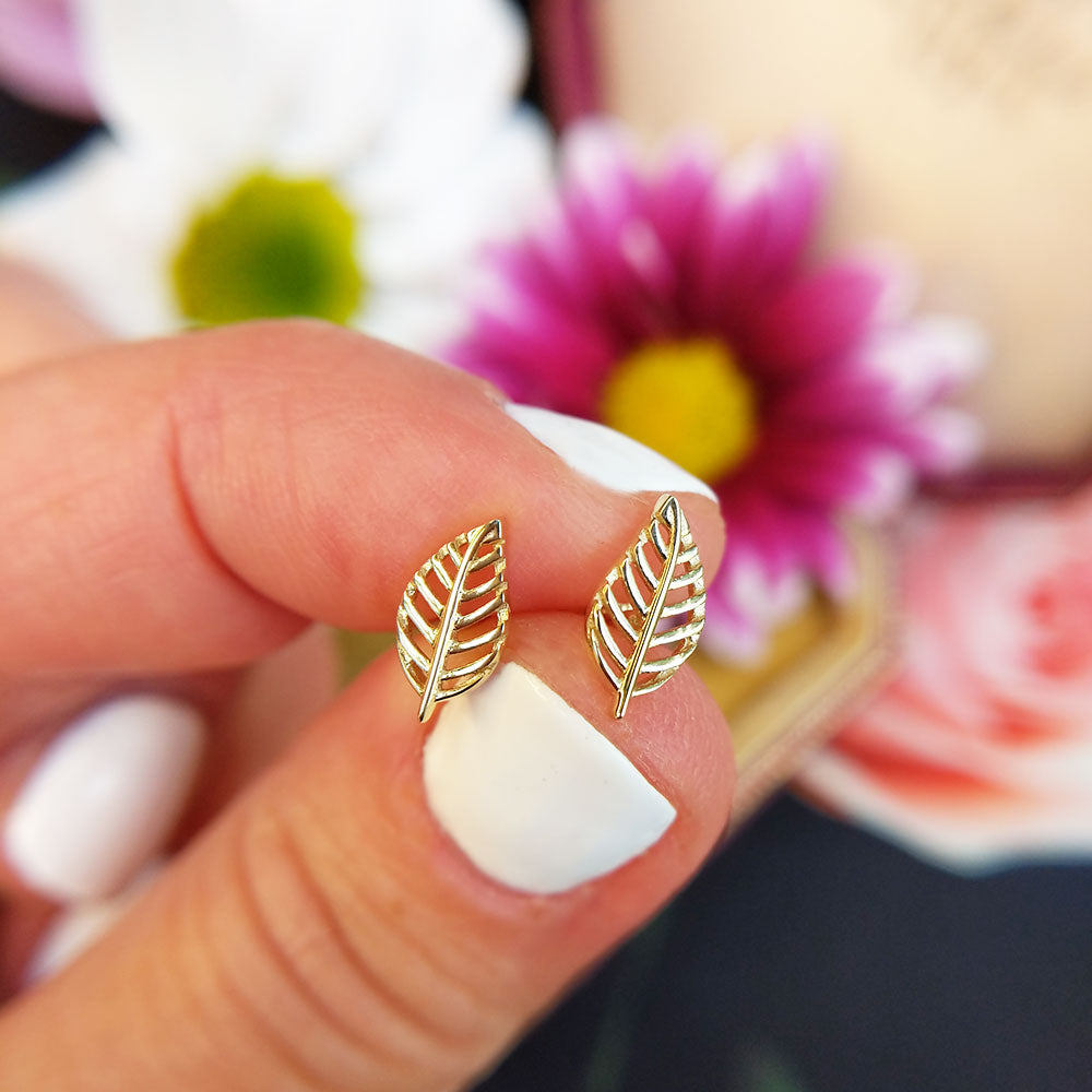 leaf studs in yellow gold