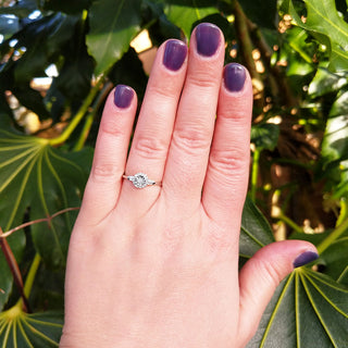 white gold art deco ring on hand