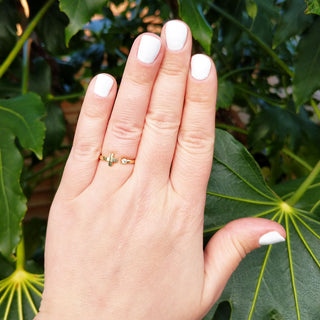 cross cuff ring on hand