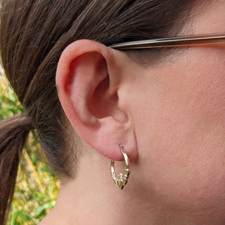 9ct gold claddagh earrings in ear