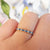 close up of sapphire stacking ring