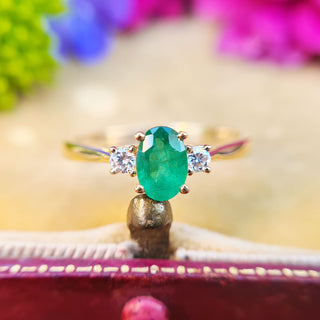 emerald and diamond engagement ring