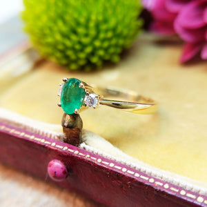 emerald trilogy ring in 18ct gold