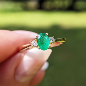 emerald and diamond three stone trilogy ring in 18K