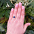 sapphire three stone ring on hand