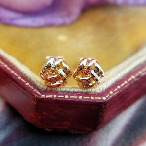 close up of knot studs made from 9ct gold