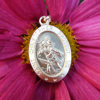 close up of st christopher necklace