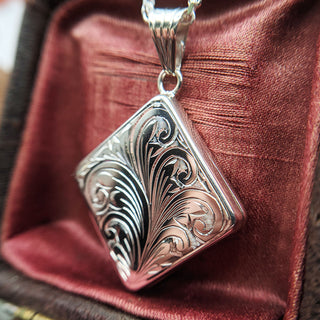 close up of engraving on locket