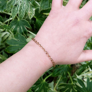 rose gold bracelet on wrist