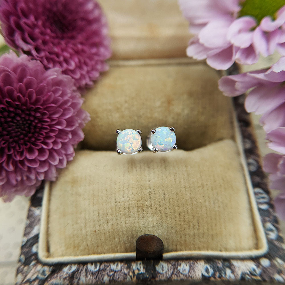 dainty opal earrings in silver