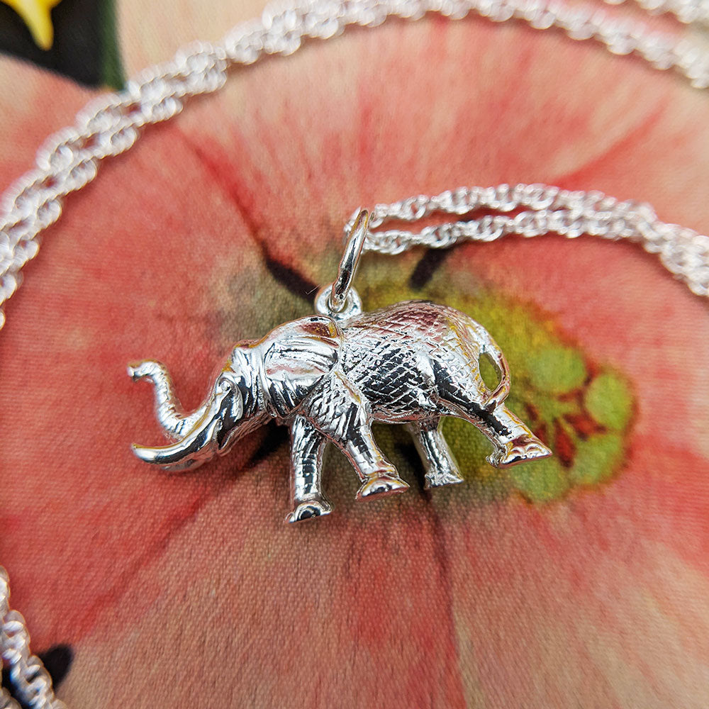 close up of silver elephant charm pendant