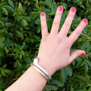 snake bangle on wrist