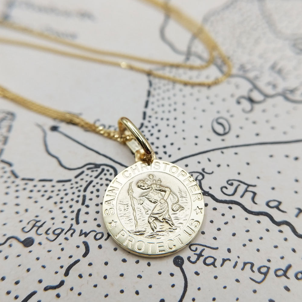 The Meaning of the St. Christopher Medal – Hamilton Jewelers