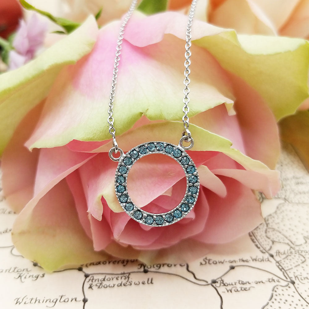 silver and aquamarine cz circle necklace