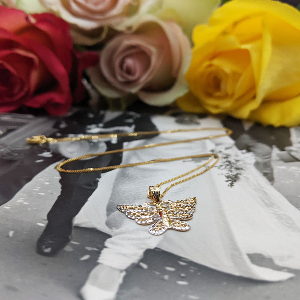 white and yellow gold butterfly pendant