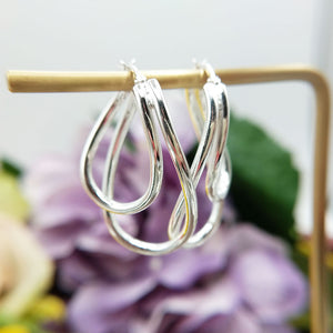 women's large silver oval hoop earrings