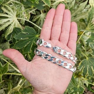 statement silver men's chain in hand for scale