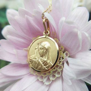 virgin mary pendant in solid gold