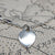 solid silver heart tag which we can engrave or leave blank