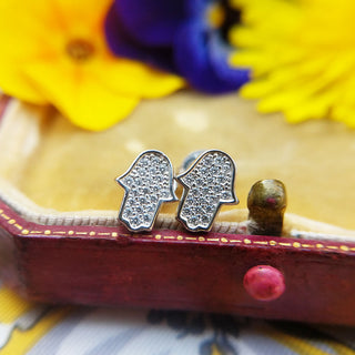 hamsa hand earrings in white gold