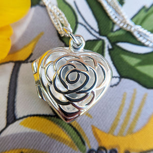 close up of heart locket and chain