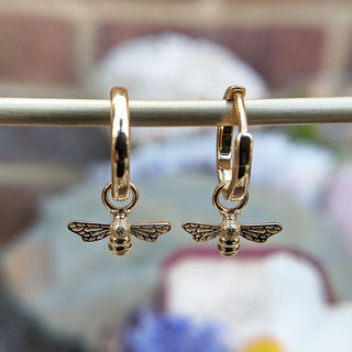 gold bee huggie earrings