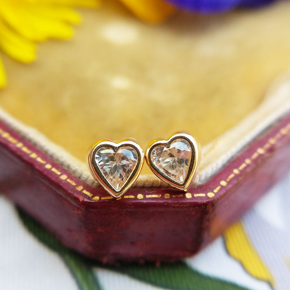 close up of heart stud earrings