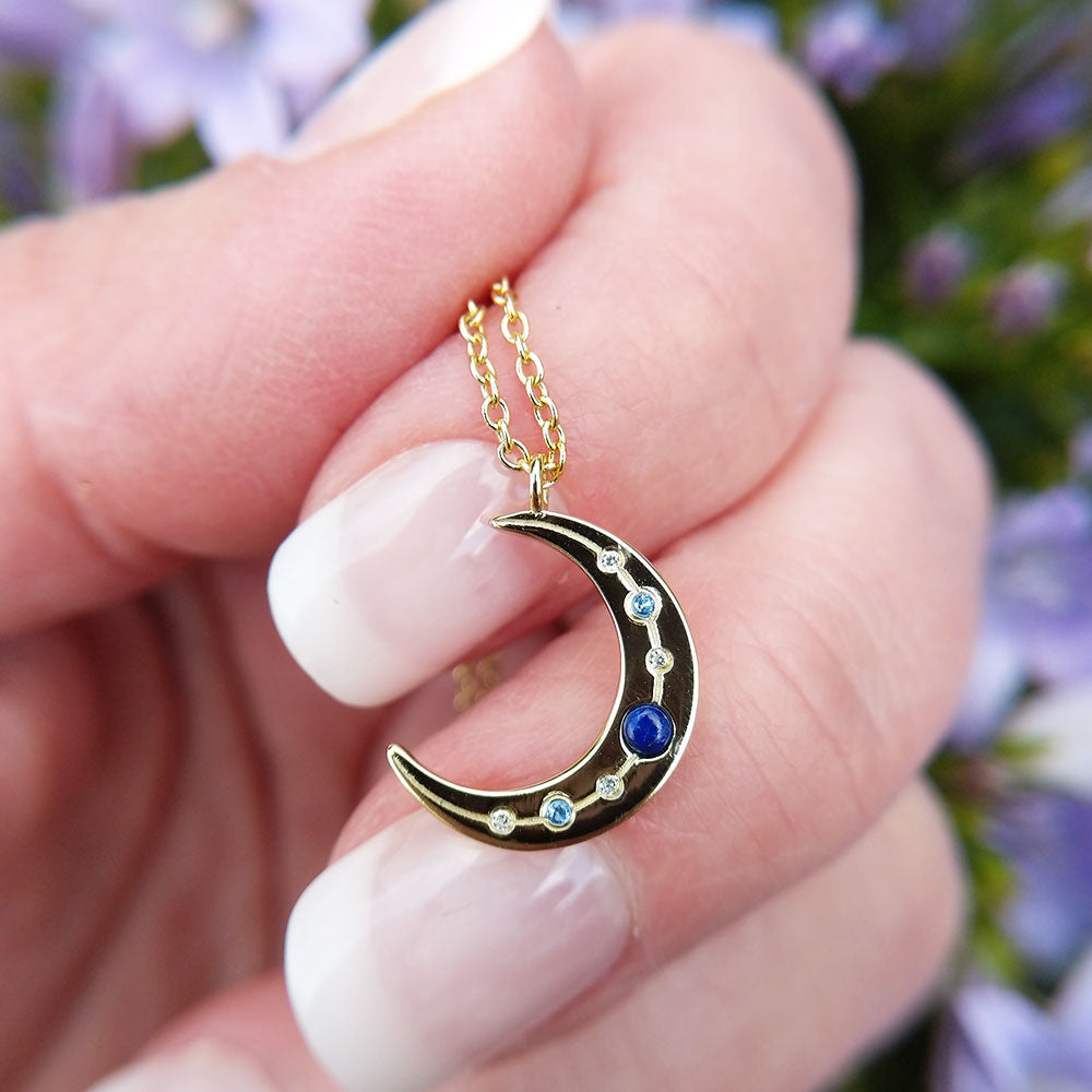 gold plated crescent moon necklace with lapis