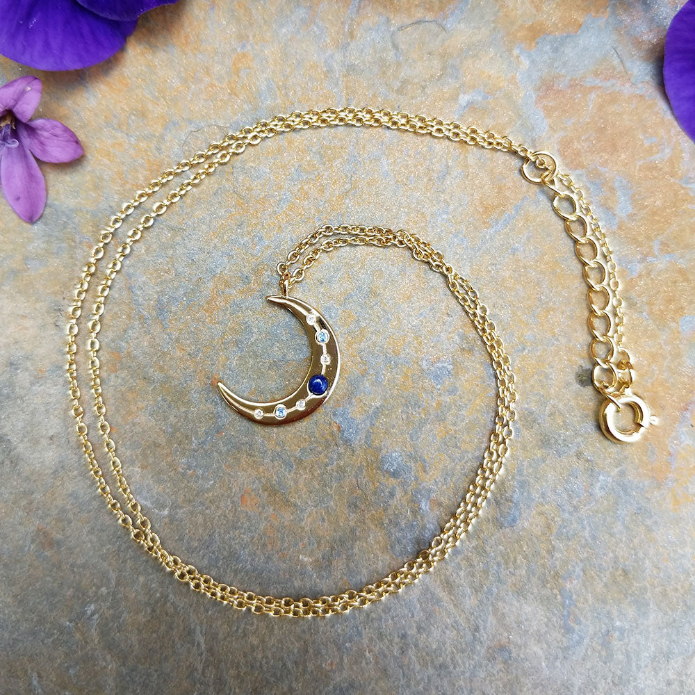 dainty crescent moon charm necklace in gold plated silver