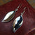 underside of women's silver leaf drop earrings