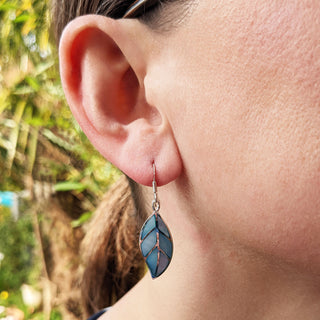 silver leaf earrings being worn