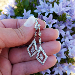 cubic zirconia drop earrings with a diamond shape