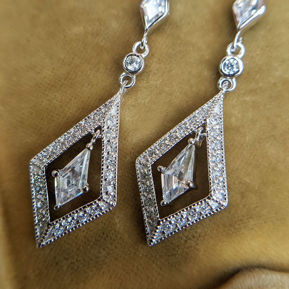cubic zirconia drop earrings with a diamond shape