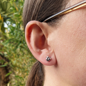 9ct white gold knot earrings in ear