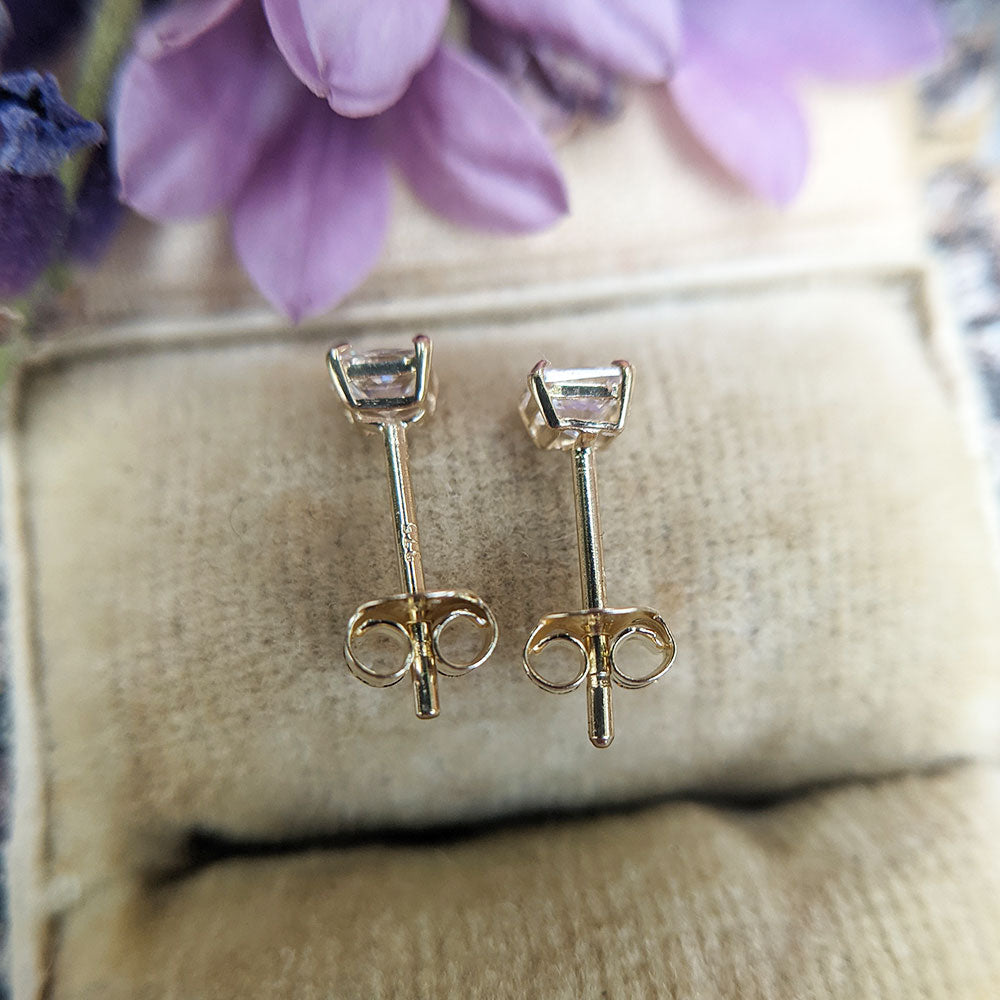 side profile of small square stud earrings