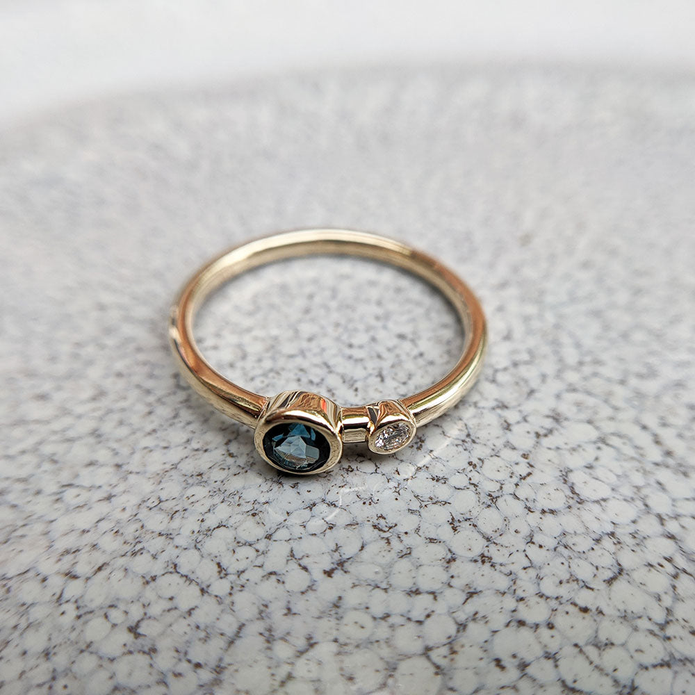 another view of 9K gold London blue topaz ring