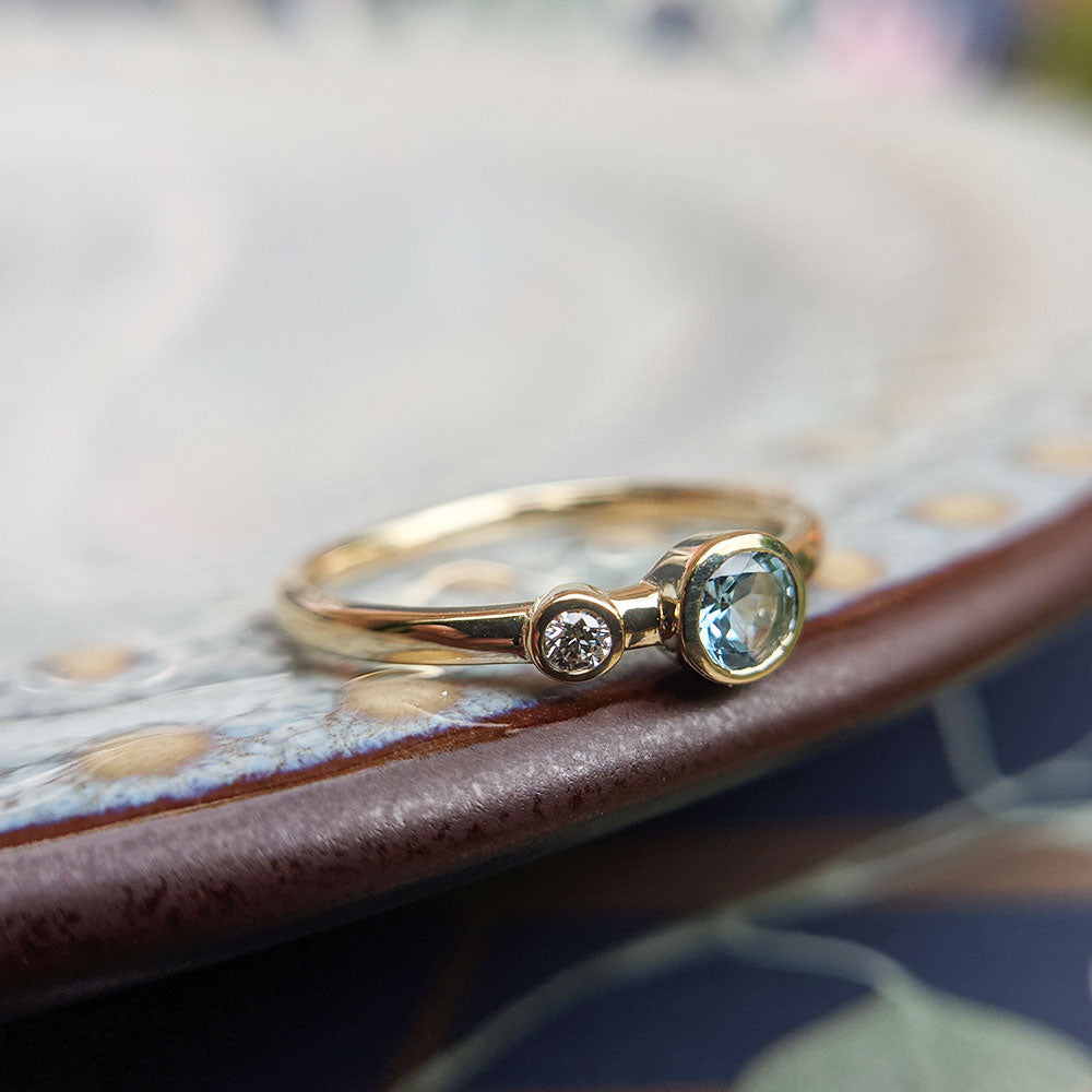 side view of 9K aquamarine diamond ring