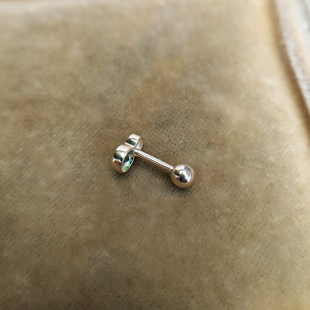 9k gold helix stud with cz to imitate emerald and diamond