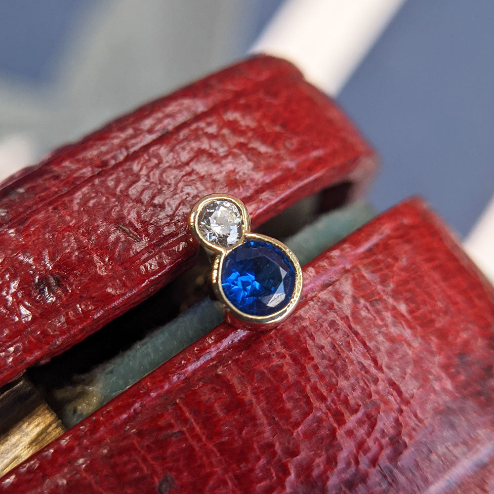 sapphire blue CZ helix stud earring in gold