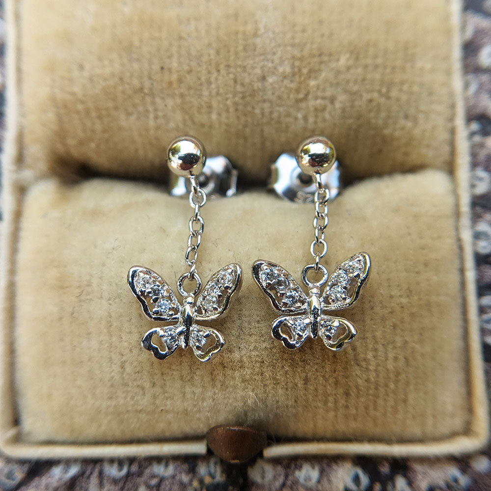 small butterfly charm earrings in sterling silver