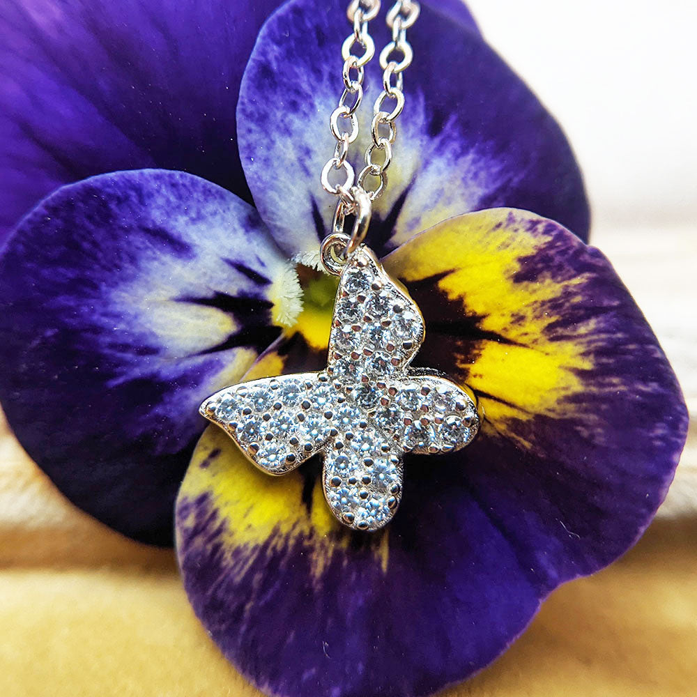 dainty butterfly charm necklace in sterling silver